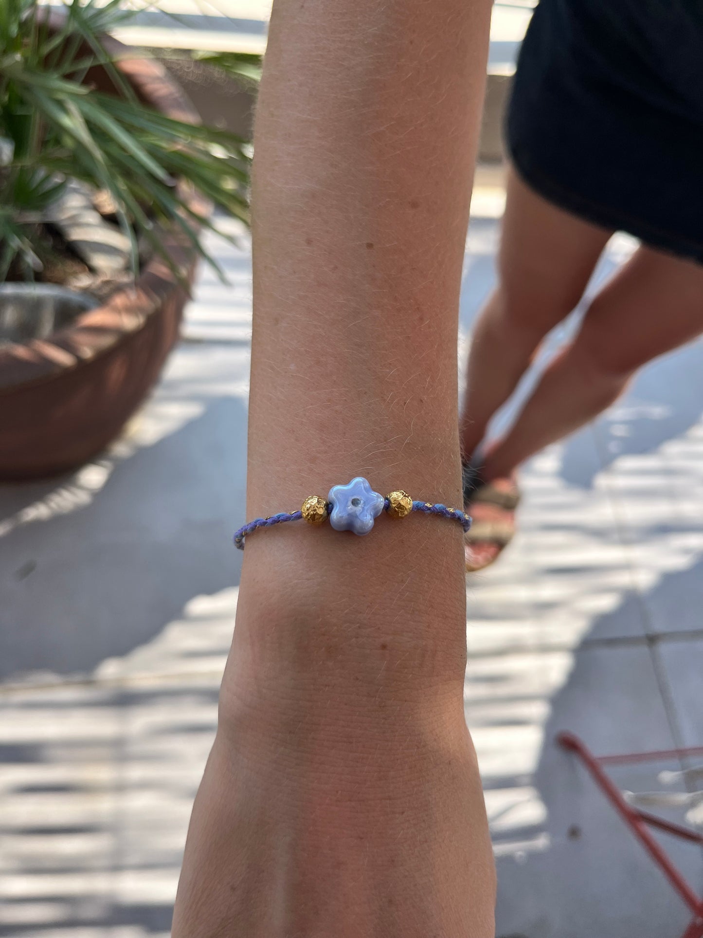 Bracelet en fils colorés œil bleu