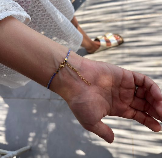 Bracelet en fils colorés œil bleu